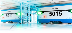 Les robots mobiles SCALLOG soulèvent des étagères à l’aide de paliers lisses Robots intralogistiques SCALLOG